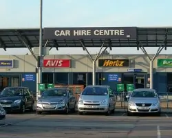 cars parked outside car rental office