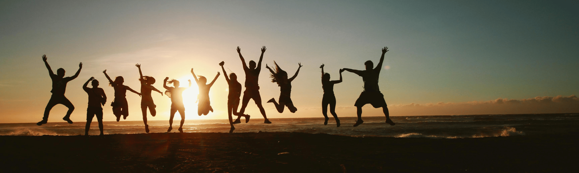 people jumping for joy because they have bought cheap car hire excess insurance