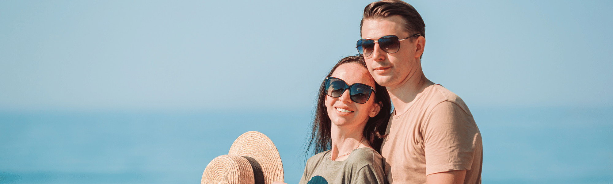 young couple wearing sunglasses