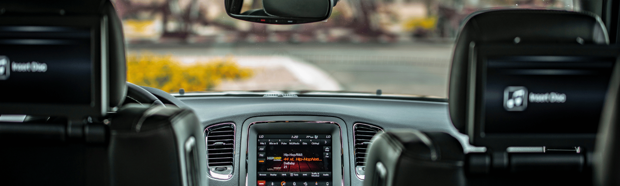 dashboard of private hire car with insurance